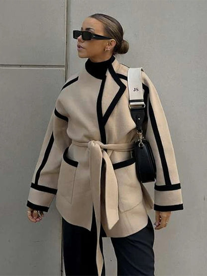 Manteau mi-long en laine bicolore à lacets